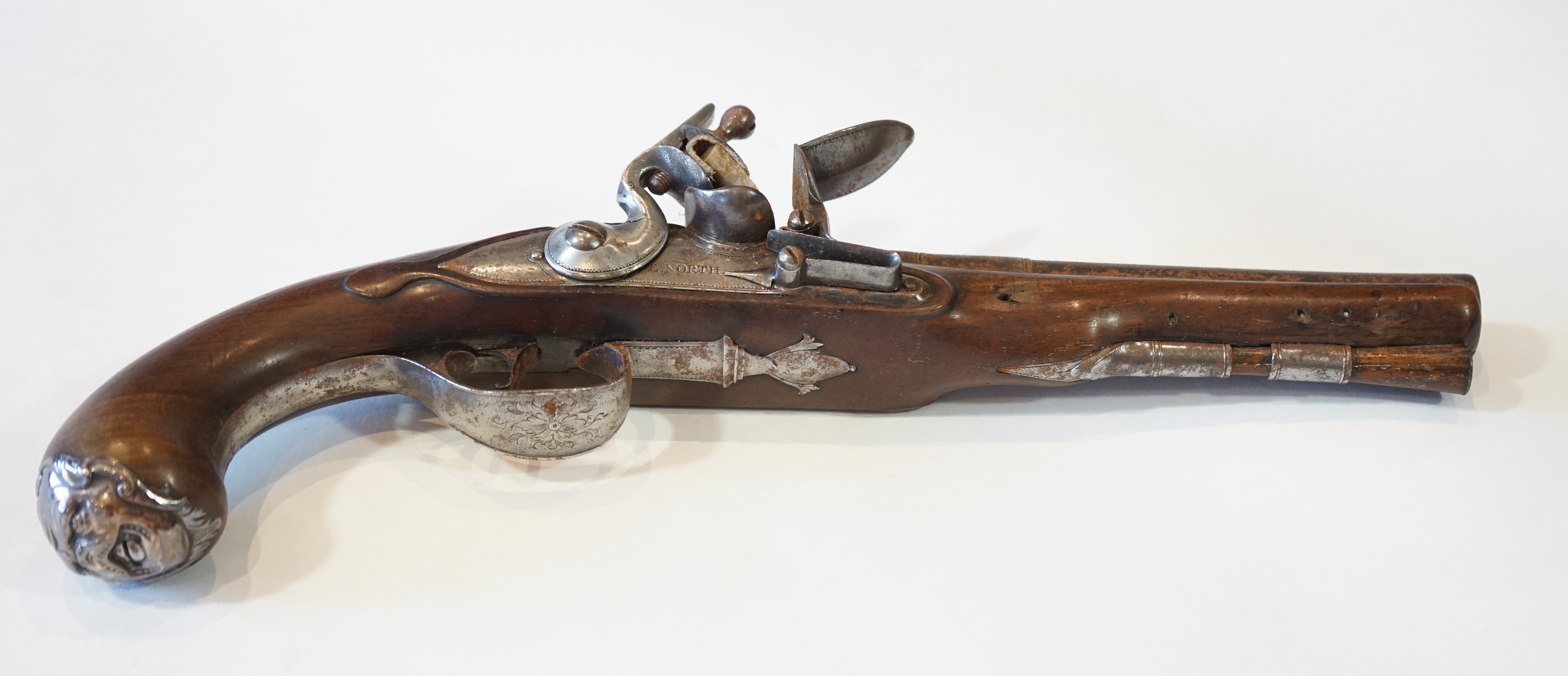 A partly silver mounted flintlock holster pistol by E. North of London, c.1760